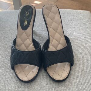 CHANEL Black Quilted Leather Slide Mules